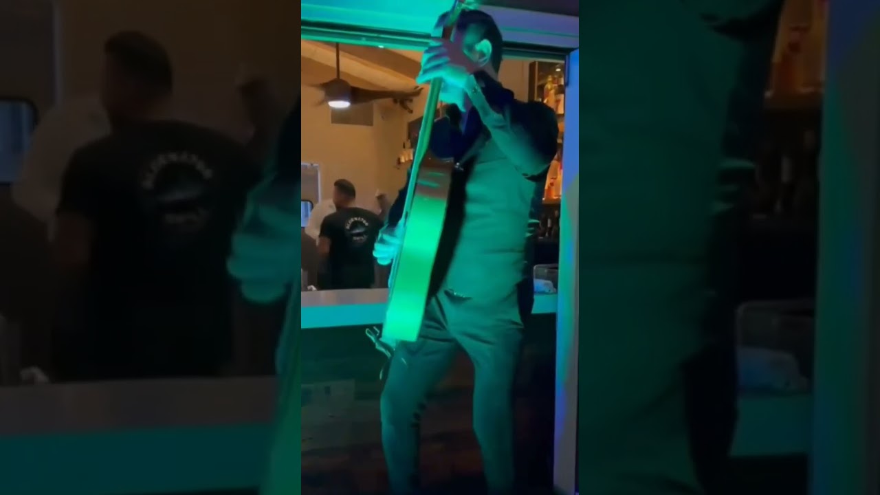 David Maldonado playing Spanish guitar for guests at an upscale restaurant