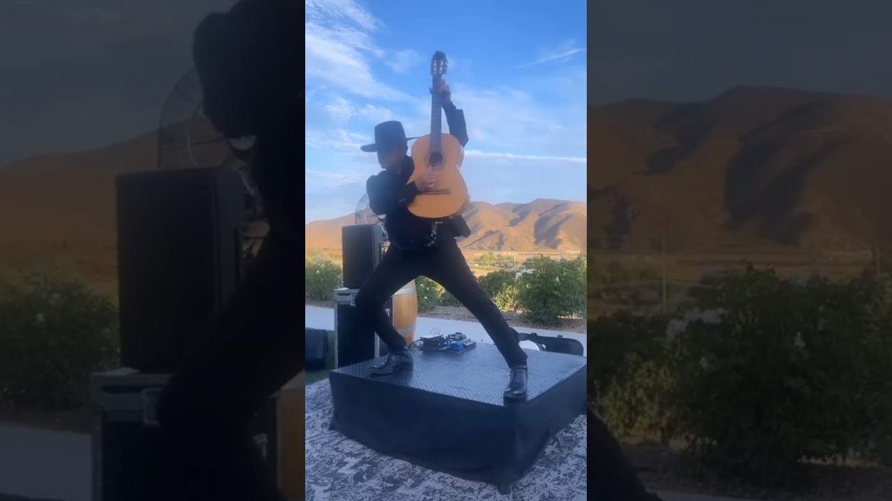 David Maldonado performing Spanish guitar at a wine country event